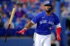 Toronto Blue Jays' Teoscar Hernandez flips his bat after hitting a three-run home run against the Atlanta Braves during the sixth inning of a baseball game Friday, April 30, 2021, in Dunedin, Fla. (AP Photo/Mike Carlson)