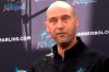 FILE - In this Feb. 24, 2020, file photo, Miami Marlins CEO Derek Jeter talks to the media before the team plays the St. Louis Cardinals in a baseball game in Jupiter, Fla. Jeter blames the team‚Äôs coronavirus outbreak on a collective false sense of security that made players lax about social distancing and wearing masks. Infected were 21 members of the team‚Äôs traveling party, including at least 18 players. (Charles Trainor Jr./Miami Herald via AP, File)