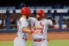 St. Louis Cardinals designated hitter Matt Carpenter (13) congratulates Yadier Molina (4) after Molina hit a home run in the seventh inning of a baseball game against the Miami Marlins, Wednesday, April 7, 2021, in Miami. (AP Photo/Marta Lavandier)