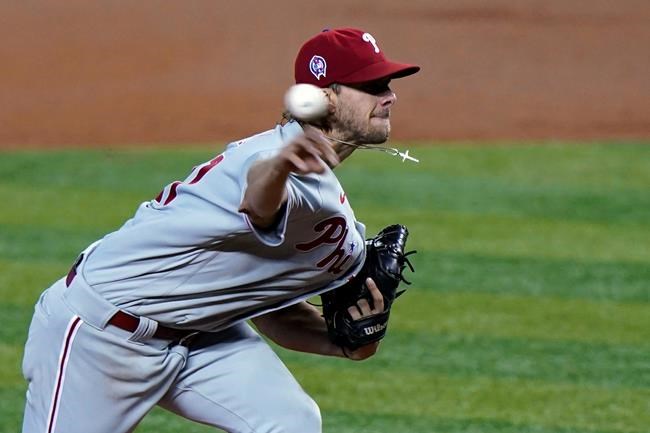 Philadelphia Phillies' Aaron Nola pitches during the first inning of a baseball gagainst the Miami Marlinsame , Friday, Sept. 11, 2020, in Miami. (AP Photo/Wilfredo Lee)