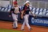 Boston Red Sox catcher Christian Vazquez, left, and starting pitcher Tanner Houck, right, walk to the dugout before a baseball game against the Miami Marlins, Tuesday, Sept. 15, 2020, in Miami. (AP Photo/Lynne Sladky)