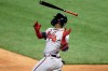 Atlanta Braves' Adeiny Hechavarria watches after hitting a double during the fifth inning of a baseball game against the Miami Marlins, Saturday, Aug. 15, 2020, in Miami. (AP Photo/Lynne Sladky)