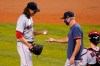 Boston Red Sox starting pitcher Mike Kickham, left, hands the ball to interim manager Ron Roenicke, right, as he is relieved during the third inning of a baseball game against the Miami Marlins, Wednesday, Sept. 16, 2020, in Miami. (AP Photo/Lynne Sladky)