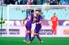 Fiorentina's Patrick Cutrone, right, celebrates after scoring his side's first goal during an Italian Cup eightfinal soccer match, between Fiorentina and Atalanta at the Artemio Franchi stadium in Florence, Italy, Wednesday, Jan. 15, 2020. ( Jennifer Lorenzini/LaPresse via AP)