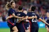 USA players celebrate after a Carli Lloyd goal during the She Believes Cup women's soccer game of USA vs. England at Exploria Stadium in Orlando on Thursday, March 5, 2020. (Stephen M. Dowell/Orlando Sentinel via AP)