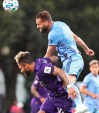 New York City FC's Maxime Chanot, top, heads the ball over Orlando City's Dom Dwyer during an MLS is Back tournament soccer match, Tuesday, July 14, 2020, in Lake Buena Vista, Fla. (Stephen M. Dowell/Orlando Sentinel via AP)