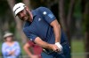 Dustin Johnson chips onto the sixth green during the final round of the Valspar Championship golf tournament, Sunday, May 2, 2021, in Palm Harbor, Fla. (AP Photo/Phelan M. Ebenhack)