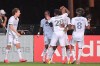 Philadelphia Union forward Sergio Santos (17) is congratulated by teammates after scoring a goal during the first half of an MLS soccer match against Sporting Kansas City, Thursday, July 30, 2020, in Kissimmee, Fla. (AP Photo/Phelan M. Ebenhack)