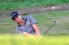Collin Morikawa chips onto the 17th green during the final round of the Workday Championship golf tournament Sunday, Feb. 28, 2021, in Bradenton, Fla. (AP Photo/Phelan M. Ebenhack)