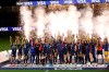 United States players and coaches celebrate during the trophy presentation after a SheBelieves Cup women's soccer match against Argentina, Wednesday, Feb. 24, 2021, in Orlando, Fla. (AP Photo/Phelan M. Ebenhack)