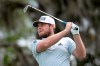 Tyrrell Hatton, of England, watches his tee shot on the second hole during the final round of the Arnold Palmer Invitational golf tournament, Sunday, March 8, 2020, in Orlando, Fla. (AP Photo/Phelan M. Ebenhack)