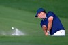 Patrick Reed hits out of a bunker onto the 15th green during the third round of the Arnold Palmer Invitational golf tournament, Saturday, March 7, 2020, in Orlando, Fla. (AP Photo/Phelan M. Ebenhack)