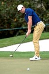 Rory McIlroy, of Northern Ireland, watches his putt on the first green during the final round of the Arnold Palmer Invitational golf tournament, Sunday, March 8, 2020, in Orlando, Fla. (AP Photo/Phelan M. Ebenhack)