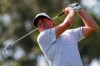 Keegan Bradley watches a shot on the eighth hole during the second round of the PGA's Valspar Championship golf touranment at Innisbrook Golf Resort in Palm Harbor, Fla., Friday, April 30, 2021. (Ivy Ceballo/Tampa Bay Times via AP)