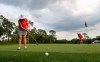Florine Mason, 69, left, putts as her friend Elaine Sterner, 76, lines up a putt as they practice along the Copperhead course at Innisbrook Golf Resort, Monday, March 16, 2020, in Palm Harbor, Fla. With the Valspar Tournament shut down due to the coronavirus outbreak, golfers had the unique opportunity to play on a tour-ready golf course. (Chris Urso/Tampa Bay Times via AP)