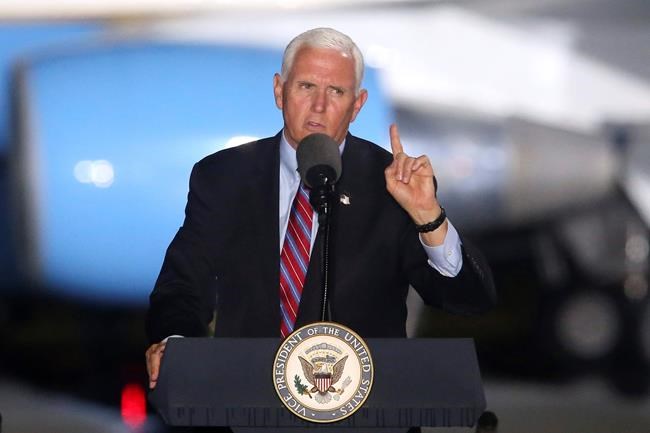 Vice President Mike Pence speaks to supporters Saturday Oct. 24, 2020 in Tallahassee, Fla. Battleground Florida was again a central focus of the presidential campaign Saturday as President Donald Trump, Vice President Mike Pence and former President Barack Obama all had high-profile events in the state. (AP Photo/Steve Cannon)