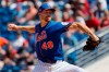 New York Mets pitcher Jacob deGrom throws during the first inning of a spring training baseball game against the Washington Nationals Sunday, March 1, 2020, in Port St. Lucie, Fla. (AP Photo/Jeff Roberson)