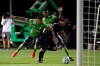 Seattle Sounders defender Xavier Arreaga, left, and defender Kelvin Leerdam, center rear, prevent San Jose Earthquakes midfielder Vako from scoring during the second half of an MLS soccer match, Friday, July 10, 2020, in Kissimmee, Fla. (AP Photo/John Raoux)