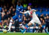 FILE - In this Saturday, Nov. 9, 2019 filer, Crystal Palace's Luka Milivojevic, right, challenges Chelsea's Fikayo Tomori during their English Premier League soccer match between Chelsea and Crystal Palace at Stamford Bridge stadium in London. Fikayo Tomori was loaned from Chelsea to AC Milan on Friday through the end of the season -- giving the Rossoneri an added option in defense in their bid to win Serie A. (AP Photo/Alastair Grant, File)