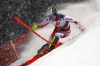 Austria's Manuel Feller speeds down the course during an alpine ski, men's World Cup slalom, in Schladming, Austria, Tuesday, Jan. 26, 2021. (AP Photo/Marco Trovati)