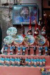 FILE - In this Wednesday, Sept. 18, 2019 file photo, statuettes of soccer legend and former Napoli player Diego Armando Maradona are displayed together with souvenirs in downtown Naples, Italy. Diego Maradona has died. The Argentine soccer great was among the best players ever and who led his country to the 1986 World Cup title before later struggling with cocaine use and obesity. He was 60. (AP Photo/Gregorio Borgia, File )