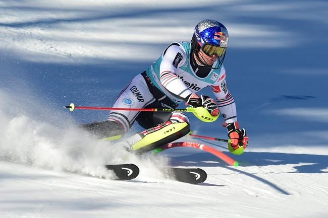 France's Alexis Pinturault speeds down the course during an alpine ski, men's World Cup slalom, in Adelboden, Switzerland, Sunday, Jan.10, 2021. (AP Photo/Marco Tacca)
