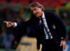 FILE - In this Friday, Sept. 7, 2018 file photo, Italy coach Roberto Mancini gestures during the UEFA Nations League soccer match between Italy and Poland at Dall'Ara stadium in Bologna, Italy. Italy coach Roberto Mancini has tested positive for the coronavirus days before the international break. The Italian soccer federation says that Mancini is ‚Äúcompletely asymptomatic‚Äù and is self-isolating at his house in Rome. The Italy squad will meet up on Sunday. It plays an international friendly against Estonia on Wednesday and hosts Poland in the Nations League four days later. (AP Photo/Antonio Calanni, File)