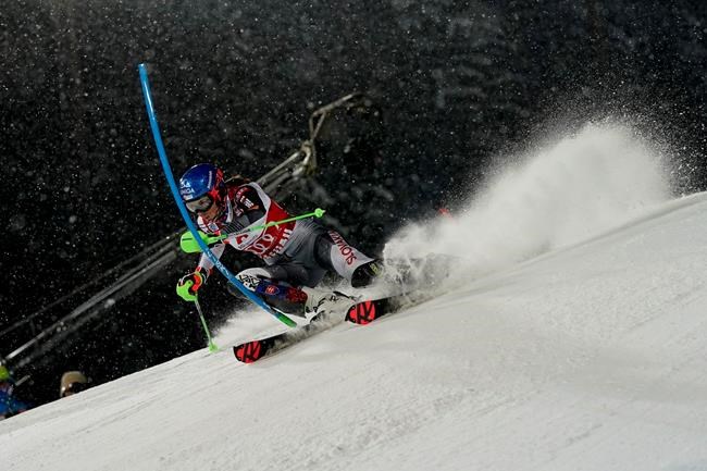 Slovakia's Petra Vlhova speeds down the course during an alpine ski, women's World Cup slalom in Flachau, Austria, Tuesday, Jan. 12, 2021. (AP Photo/Giovanni Auletta)