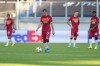 Roma's Henrikh Mkhitaryan, foreground, and teammate react after Sevilla's Sergio Reguilon scored his side's opening goal, during the Europa League, round of 16 soccer match between Roma and Sevilla, at the Schauinsland-Reisen-Arena in Duisburg, Germany, Thursday, Aug. 6, 2020. (Friedemann Vogel/Pool Photo via AP)