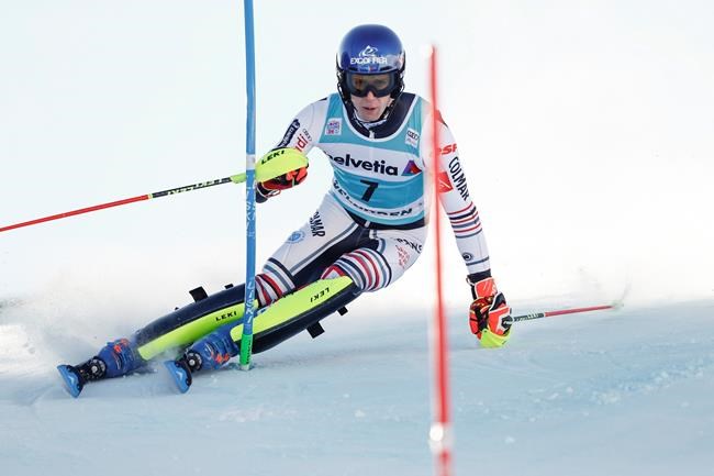 France's Clement Noel speeds down the course during an alpine ski, men's World Cup slalom, in Adelboden, Switzerland, Sunday, Jan.10, 2021. (AP Photo/Gabriele Facciotti)
