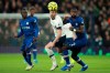 Tottenham's Harry Kane and Chelsea's Antonio Rudiger, right, eye the ball during the English Premier League soccer match between Tottenham Hotspur and Chelsea, at the Tottenham Hotspur Stadium in London, Sunday, Dec. 22, 2019. (AP Photo/Ian Walton)
