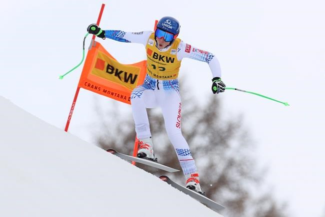Slovakia's Petra Vlhova speeds down the course during the super-G portion of an alpine ski, women's World Cup alpine combined, in Crans Montana, Switzerland, Sunday, Feb. 23, 2020. (AP Photo/Alessandro Trovati)
