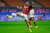 AC Milan's Zlatan Ibrahimovic scores his side's opening goal during the Serie A soccer match between AC Milan and Roma at the Milan San Siro Stadium, Italy, Monday, Oct. 26, 2020. (AP Photo/Luca Bruno)