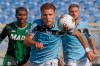 Lazio's Ciro Immobile eyes the ball during the Serie A soccer match between Lazio and Sassuolo at the Rome Olympic Stadium Saturday, July 11, 2020. (AP Photo/Alessandra Tarantino)