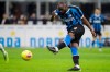 Inter Milan's Romelu Lukaku fires a shot during a Serie A soccer match between Inter Milan and Genoa, at the San Siro stadium in Milan, Italy, Saturday, Dec. 21, 2019. (AP Photo/Luca Bruno)