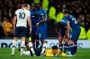 Chelsea's goalkeeper Kepa Arrizabalaga lies on the pitch next to Tottenham's Moussa Sissoko after clashing, during the English Premier League soccer match between Tottenham Hotspur and Chelsea, at the Tottenham Hotspur Stadium in London, Sunday, Dec. 22, 2019. (AP Photo/Ian Walton)