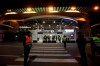 Stewards stand at a gate of the San Siro stadium in Milan, Italy, Thursday, Feb. 27, 2020. Ludogorets is playing Italian club Inter Milan in a Europa League soccer match on Thursday that is scheduled to go ahead in an empty stadium due to the coronavirus outbreak. (AP Photo/Luca Bruno)