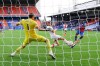 Crystal Palace's Wilfried Zaha, right, scores his side's opening goal during the English Premier League soccer match between Crystal Palace and Southampton, at Selhurst Park, London, Saturday, Sept. 12, 2020. (Richard Heathcote, Pool via AP)