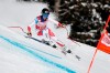 Switzerland's Lara Gut-Behrami speeds down the course during an alpine ski, women's World Cup super-G, in Crans Montana, Switzerland, Sunday, Jan. 24, 2021. (AP Photo/Gabriele Facciotti)