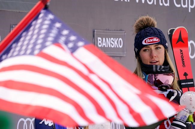 United States' Mikaela Shiffrin stands on the podium after winning an alpine ski, women's World Cup super-G, in Bansko, Bulgaria, Sunday, Jan. 26, 2020. (AP Photo/Giovanni Auletta)