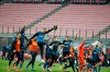Inter players celebrate their 3-0 win at the end of the Serie A soccer match between AC Milan and Inter Milan, at the Milan San Siro Stadium, Italy, Sunday, Feb. 21, 2021. (AP Photo/Antonio Calanni)