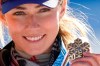 United States' Mikaela Shiffrin shows her bronze medal of the women's slalom, at the alpine ski World Championships in Cortina d'Ampezzo, Italy, Saturday, Feb. 20, 2021. (AP Photo/Giovanni Auletta)