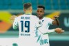 Hoffenheim's Ishak Belfodil, left, celebrates with teammate Ryan Sessegnon after scoring the opening goal during the Europa League Group L soccer match between Gent and Hoffenheim at the KAA Gent stadium in Gent, Belgium, Thursday, Oct. 29, 2020. (AP Photo/Olivier Matthys)