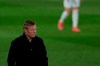 Barcelona's head coach Ronald Koeman follows the action from the side line during the Spanish La Liga soccer match between Real Madrid and FC Barcelona at the Alfredo di Stefano stadium in Madrid, Spain, Saturday, April 10, 2021. (AP Photo/Manu Fernandez)