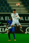 Hoffenheim's Sargis Adamyan heads the ball during the Europa League Group L soccer match between Gent and Hoffenheim at the KAA Gent stadium in Gent, Belgium, Thursday, Oct. 29, 2020. Hoffenheim won 4-1. (AP Photo/Olivier Matthys)