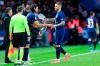 PSG's Mauro Icardi, right, is replaced by teammate Edinson Cavani during French League One soccer match between Paris Saint-Germain and Lille at the Parc des Princes stadium in Paris, Friday, Nov. 22, 2019. (AP Photo/Michel Euler)