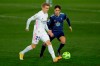 Real Madrid's Martin Odegaard, left, vies for the ball with Celta Vigo's Denis Suarez during the Spanish La Liga soccer match between Real Madrid and Celta Vigo at the Alfredo Di Stefano stadium in Madrid, Spain, Saturday, Jan. 2, 2021. Real Madrid won 2-0. (AP Photo/Manu Fernandez)