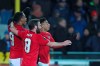 Manchester United's Anthony Martial, left, celebrates with teammates after scoring his side's first goal during an Europa League round of 32 first leg soccer match between Brugge and Manchester United at the Jan Breydel stadium in Bruges, Belgium, Thursday, Feb. 20, 2020. Martial scored once and the match ended in a 1-1 draw. (AP Photo/Francisco Seco)