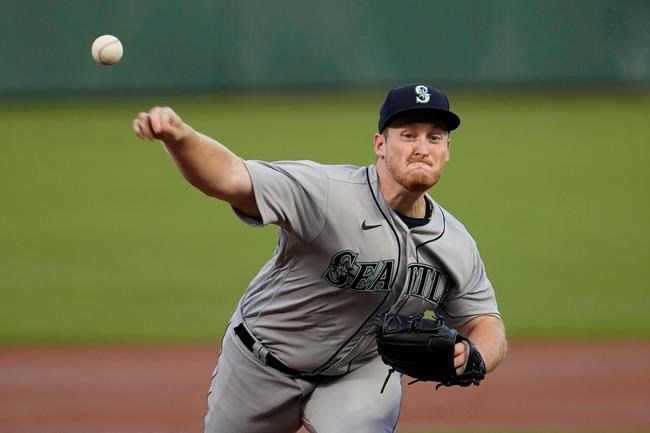 Seattle Mariners' Ljay Newsome pitches against the San Francisco Giants during the first inning of a baseball game in San Francisco, Wednesday, Sept. 16, 2020. This is a makeup of a game postponed Tuesday in Seattle. (AP Photo/Jeff Chiu)