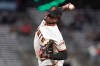 San Francisco Giants' Gregory Santos pitches against the Miami Marlins during the sixth inning of a baseball game in San Francisco, Thursday, April 22, 2021. (AP Photo/Jeff Chiu)